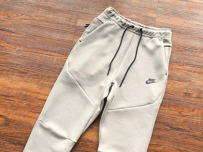 NIKE Tech Fleece Hoodie - Olive - Enigma Stone - Grey Unisex Streetwear Limited Edition - The NIKE TECH FLEECE PANTS OLIVE GREY/ENIGMA STONE - REPLICA offer the perfect balance of