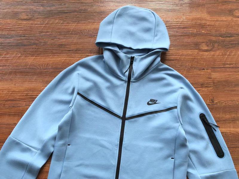 NIKE Tech Fleece Hoodie - Light - Blue Unisex Streetwear Limited Edition - The NIKE TECH FLEECE HOODIE LIGHT BLUE - REPLICA delivers modern sportswear innovation with a