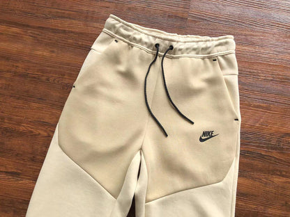 NIKE Tech Fleece Pants - Beach - Brown Unisex Streetwear Limited Edition - The NIKE TECH FLEECE PANTS BEACH BROWN - REPLICA deliver a perfect mix of modern