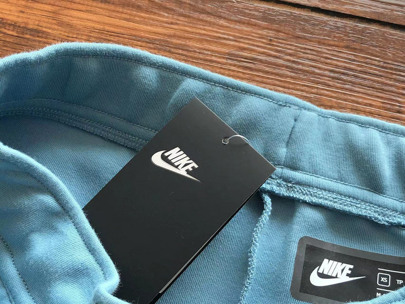 NIKE Tech Fleece Pants - Baby - Blue Unisex Streetwear Limited Edition - The NIKE TECH FLEECE PANTS BABY BLUE - REPLICA combine modern athletic innovation with sleek