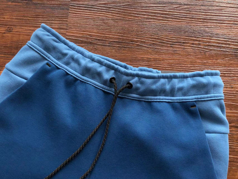 NIKE Tech Fleece Pants - Dutch - Court - Blue Unisex Streetwear Limited Edition - The NIKE TECH FLEECE PANTS DUTCH BLUE/COURT BLUE - REPLICA offer the perfect fusion of