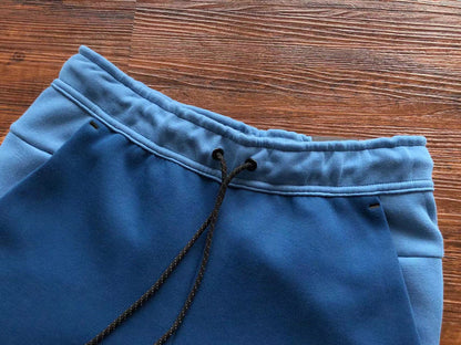 NIKE Tech Fleece Pants - Dutch - Court - Blue Unisex Streetwear Limited Edition - The NIKE TECH FLEECE PANTS DUTCH BLUE/COURT BLUE - REPLICA offer the perfect fusion of