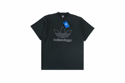 Balenciaga T-shirt With Adidas Logo - Black Unisex Streetwear Limited Edition - <p dir='ltr'><span>Black t-shirt featuring a large Adidas trefoil logo with Balenciaga branding. Combines classic
