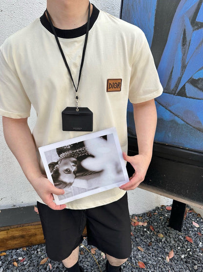 Camiseta Dior color crema con ribete negro