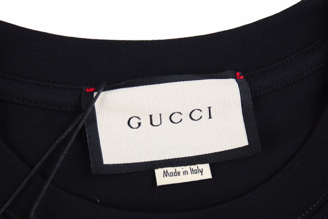 Camiseta gráfica de setas de Gucci