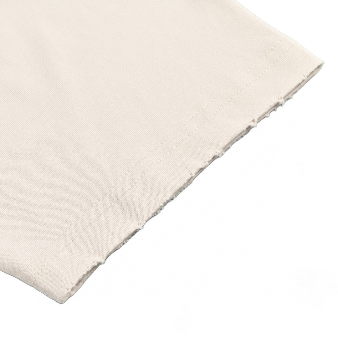 Camiseta beige con logo estampado de Balenciaga