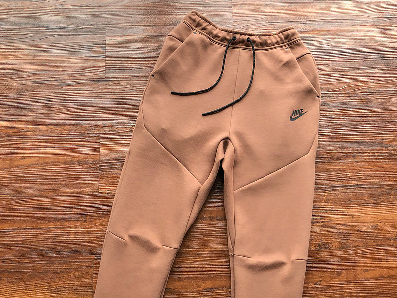 NIKE Tech Fleece Pants - Archeo - Brown Unisex Streetwear Limited Edition - The NIKE TECH FLEECE PANTS ARCHEO BROWN - REPLICA blend modern sportswear innovation with a