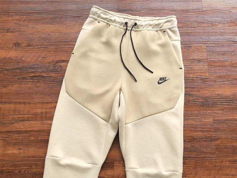 NIKE Tech Fleece Pants - Beach - Brown Unisex Streetwear Limited Edition - The NIKE TECH FLEECE PANTS BEACH BROWN - REPLICA deliver a perfect mix of modern