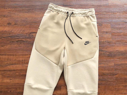 NIKE Tech Fleece Pants - Beach - Brown Unisex Streetwear Limited Edition - The NIKE TECH FLEECE PANTS BEACH BROWN - REPLICA deliver a perfect mix of modern