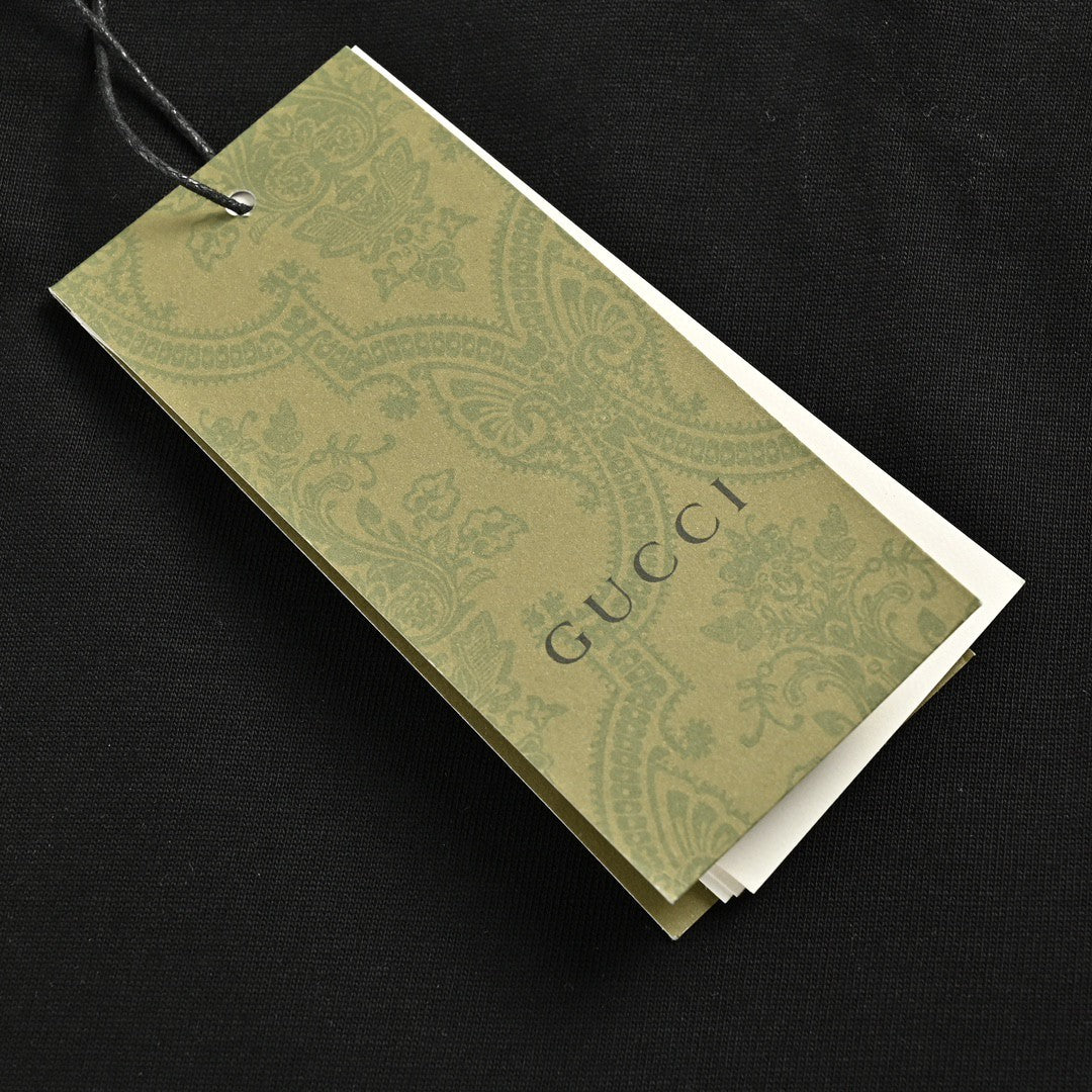 Camiseta Gucci con carita sonriente