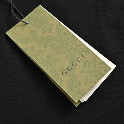 Camiseta Gucci con carita sonriente