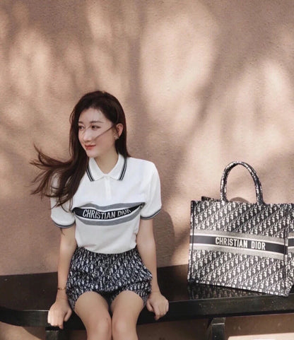 Polo Christian Dior con logo a rayas