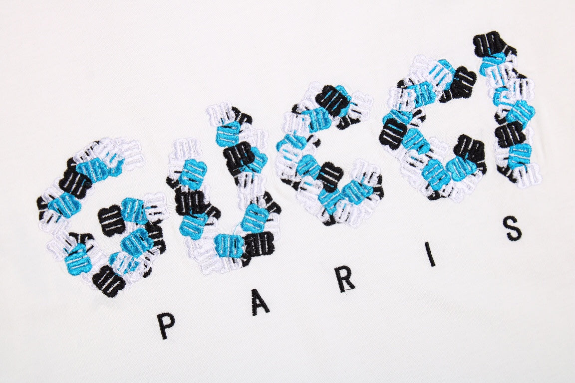 Camiseta blanca GUCCI x BALENCIAGA con logo de flor