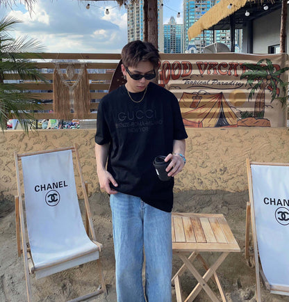 Camiseta Gucci con ciudades bordadas