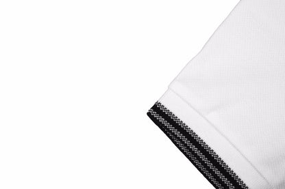 Polo Christian Dior con logo a rayas