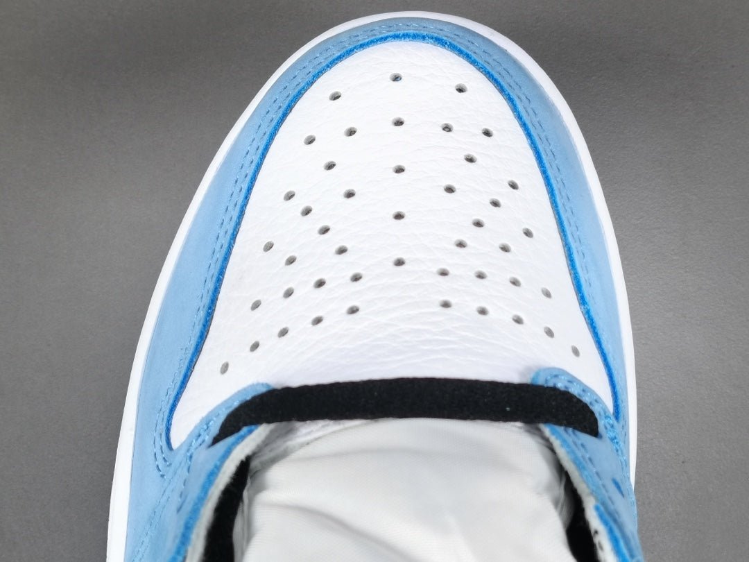 JORDAN 1 Retro High Og - University Jogger Pants - Blue Unisex Streetwear Limited Edition - Introducing the Jordan 1 High University Blue - a legendary sneaker that combines timeless style