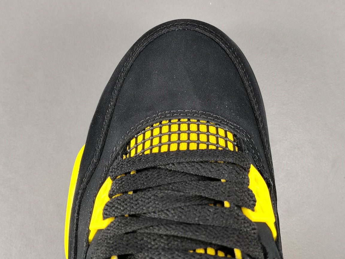 JORDAN 4 - Thunder Sneakers - Black Unisex Streetwear Limited Edition - Introducing the iconic Jordan 4 Thunder, a legendary sneaker that embodies the spirit of greatness