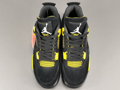 JORDAN 4 - Thunder Sneakers - Black Unisex Streetwear Limited Edition - Introducing the iconic Jordan 4 Thunder, a legendary sneaker that embodies the spirit of greatness